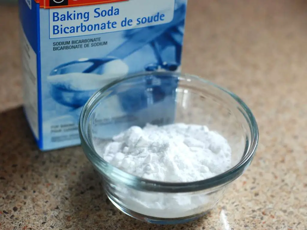Baking soda is being used to adjust the alkalinity of a Koi pond.